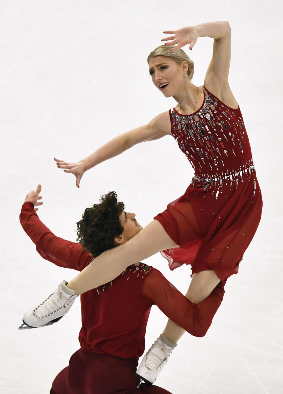 Piper Gilles and Paul Poirier of Canada perform during the Ice Dance-Free Dance at the Figure Skating World Championships in Stockholm, Sweden, Saturday, March 27, 2021. (AP Photo/Martin Meissner)
