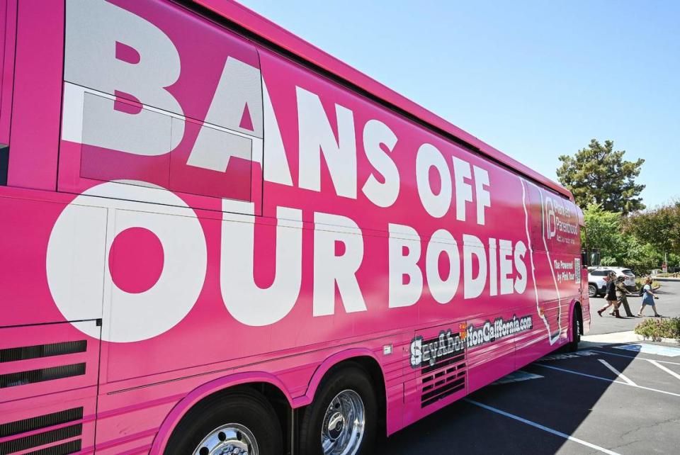 The pink bus run by Planned Parenthood Affiliates of California stands parked in the parking lot of the Unitarian Universalist Church of Fresno during their “Powered by Pink” Bus Tour stop on May 17, 2022.