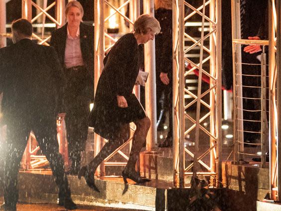 May arrives at Battersea Park in London for the annual Black and White Ball, a fundraiser held by the Conservative Party (Peter Macdiarmid/LNP)