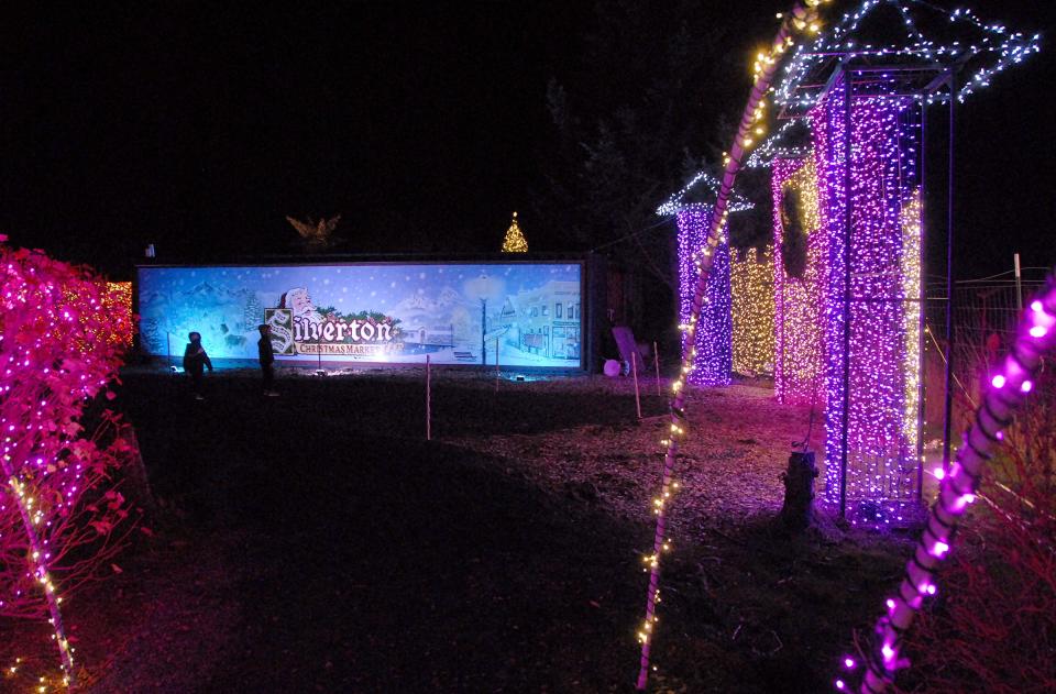 A year-old Silverton Christmas Market mural greets visitors along the pathways of light tunnels, themed displays and a German market with Christmas-themed vendors.