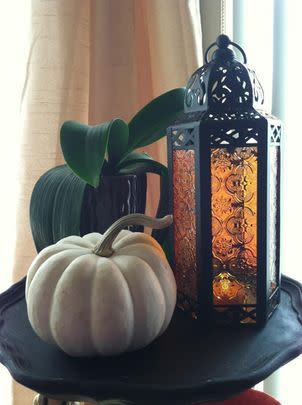A gorgeous Moroccan-style amber glass lantern that'll look rustic and spooky next to all your Halloween decor