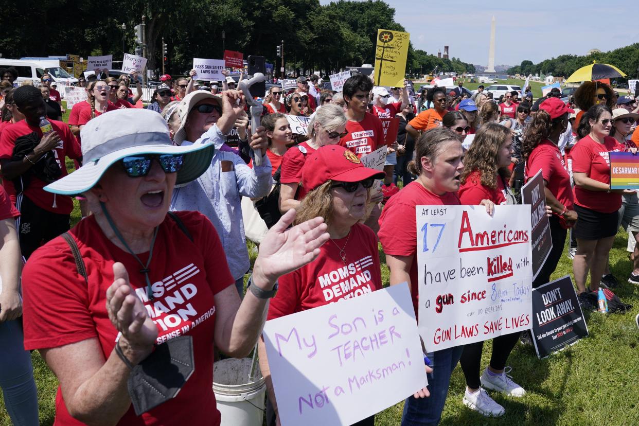 People attend a protest near Capitol Hill in Washington, Wednesday, June 8, 2022, sponsored by Everytown for Gun Safety and its grassroots networks, Moms Demand Action and Students Demand Action, as gun violence survivors and hundreds of gun safety supporters demand that Congress act on gun safety issues.