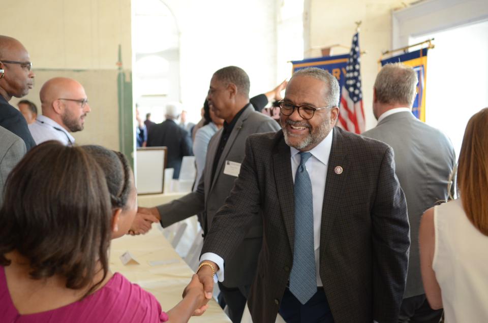 U.S. Rep. Troy Carter, who represents Louisiana's second congressional district, smiles as he greets an attendee.