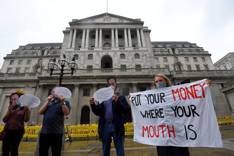 FILE PHOTO: Environmental protest to encourage a green economy, outside of the Bank of England in the City of London, Britain