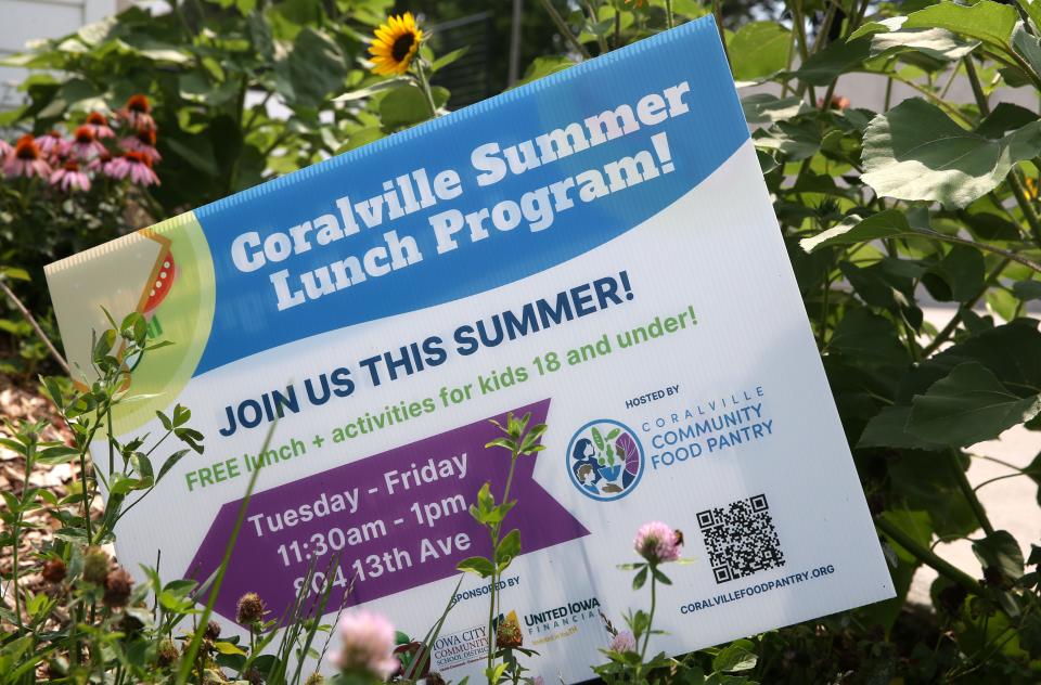 A sign detailing the Coralville Summer Lunch Program is pictured outside the Coralville Community Food pantry Monday, July 15, 2024 in Coralville, Iowa.