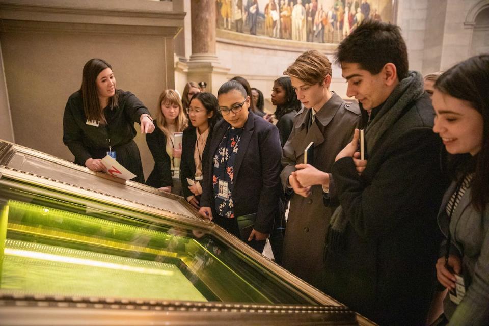 Students see the U.S. Constitution on display at the National Archives Building as part of the 57th annual United States Senate Youth Program held in Washington, D.C., on March 2-9, 2019.