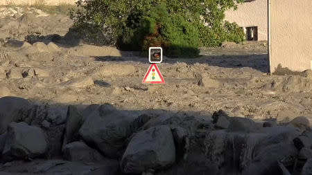 Still image taken from video shows the remote village Bondo in Switzerland, August 23, 2017 after a landslide struck the village in a remote Swiss valley. REUTERS/LOCAL TEAM via Reuters TV