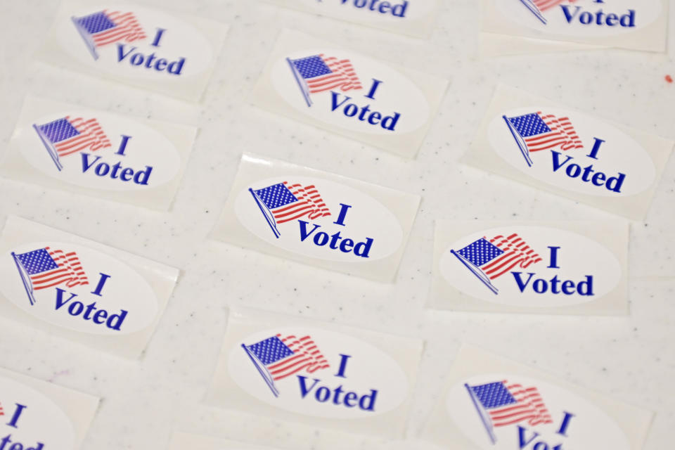 I voted stickers are set out on a table for voters to take after submitting their ballots at Elmdale Baptist Church Tuesday, March 5, 2024, in Springdale, Ark. Super Tuesday elections are being held in 16 states and one territory. Hundreds of delegates are at stake, the biggest haul for either party on a single day. (AP Photo/Michael Woods)