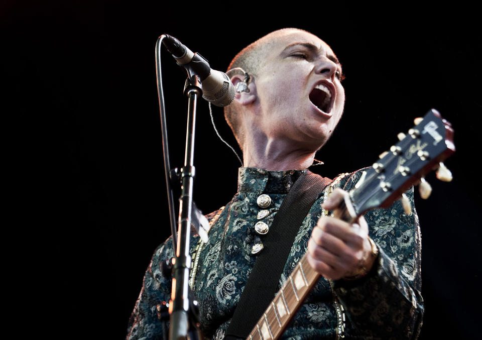 FILE - Irish singer-songwriter Sinéad O'Connor in concert on the first night of the Toender Folk Music Festival in Toender, on the south western part of Denmark on Aug. 23, 2013. O’Connor, the gifted Irish singer-songwriter who became a superstar in her mid-20s but was known as much for her private struggles and provocative actions as for her fierce and expressive music, has died at 56. The singer's family issued a statement reported Wednesday by the BBC and RTE. (AP Photo/Casper Dalhoff, Polfoto, File)