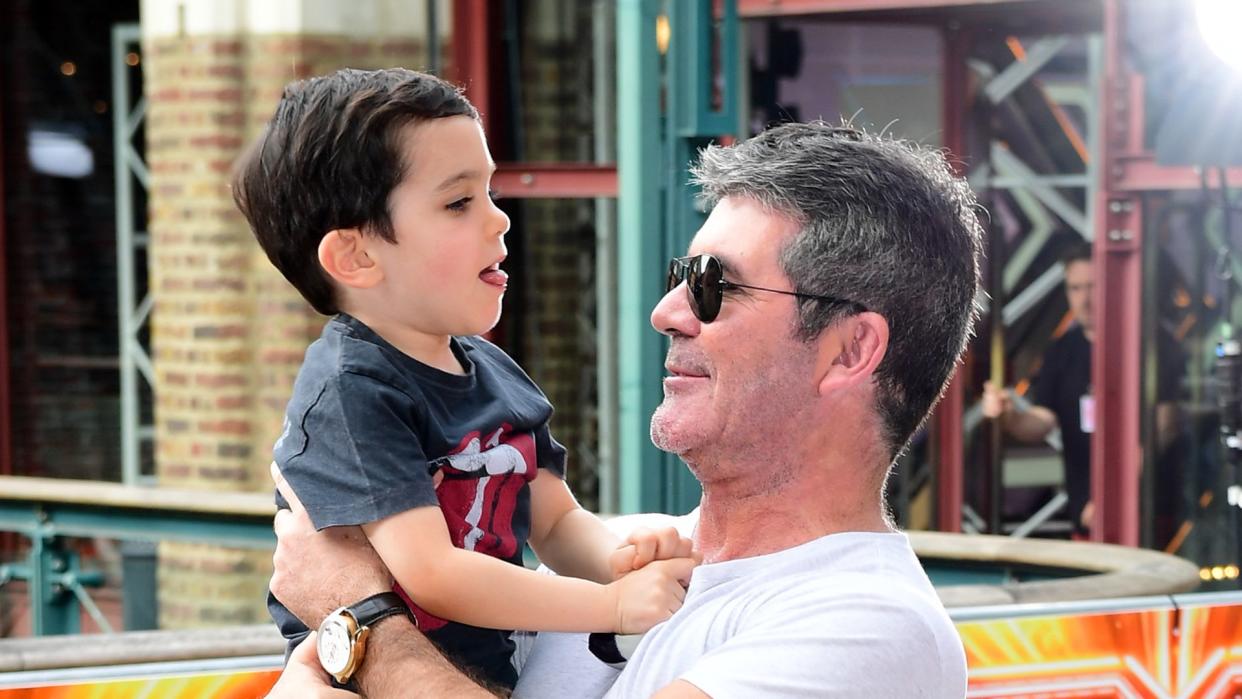 Simon Cowell and son Eric Cowell attending X Factor filming at Tobacco Dock, Wapping Lane, London.