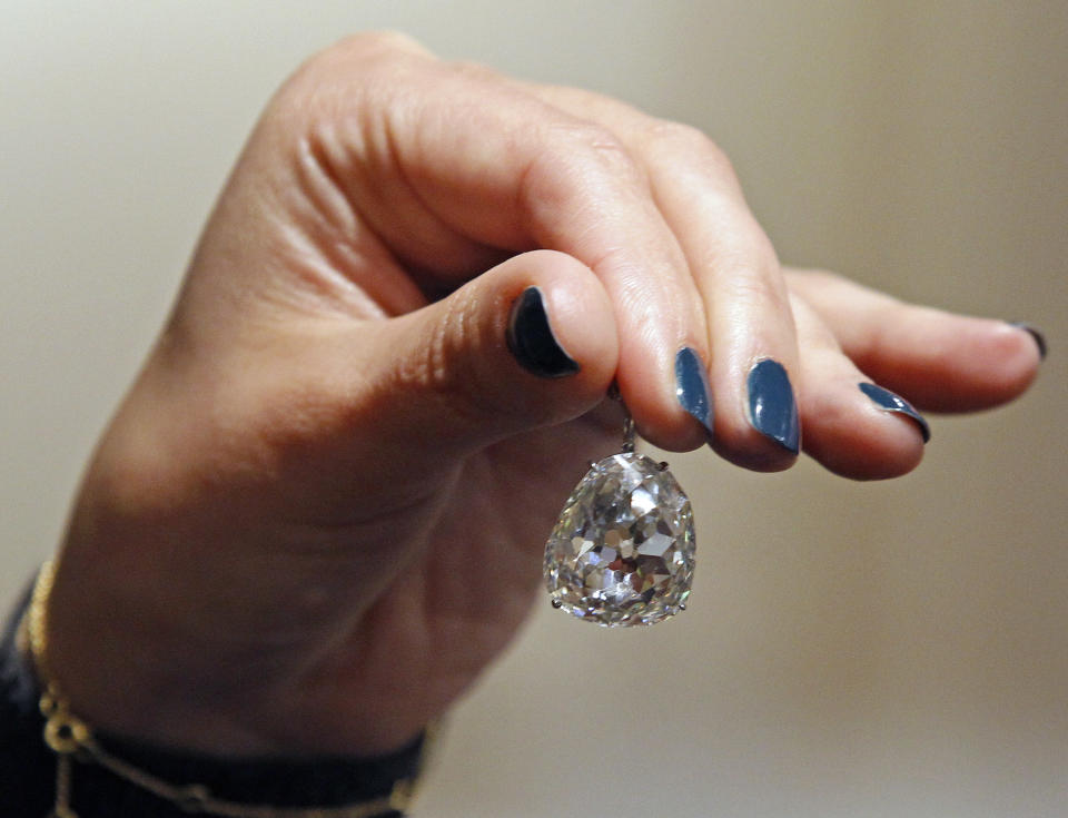 The Beau Sancy, a 34.98 carat diamond that will be put on sale by Sotheby's auction house in Geneva next month, is presented in Paris, Monday April 23, 2012. The Beau Sancy diamond, a stone of historical importance with a royal provenance stretching back to Marie de Medicis is estimated between two and four million dollars, (1.5 to 3 million Euros).(AP Photo/Remy de la Mauviniere)