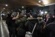 Frederic Doyez, the lawyer of French priest Bernard Preynat, speaks to the media at the Lyon court house, central France, Tuesday Jan. 14, 2020. The former French priest accused of sexually abusing some 75 boys when he worked as their scout chaplain is on trial in Lyon. The case is France's worst clergy abuse drama to reach court. (AP Photo/Laurent Cipriani)