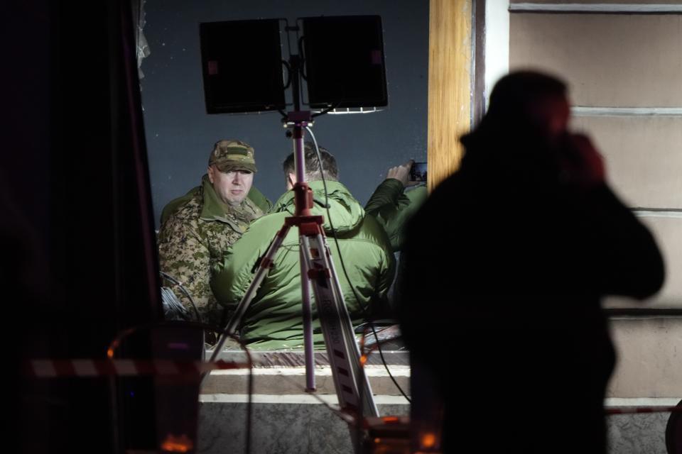 Russian investigators work at the side of an explosion at a cafe in St. Petersburg, Russia, Sunday, April 2, 2023. An explosion tore through a cafe in the Russian city of St. Petersburg on Sunday, and preliminary reports suggested a prominent military blogger was killed and more than a dozen people were injured. (AP Photo)