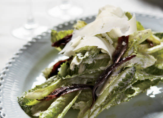 <strong>Get the <a href="http://www.huffingtonpost.com/2011/10/27/garlicky-caesar-salad_n_1058404.html">Garlicky Caesar Salad Recipe</a></strong>