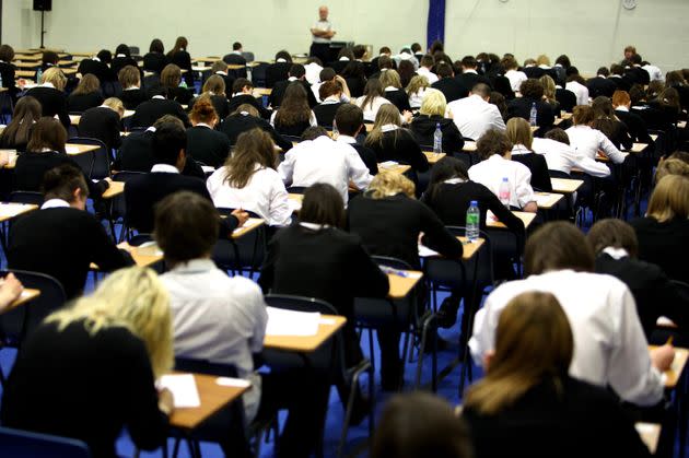 Pupils sit an exam. (Photo: Jeff J Mitchell via Getty Images)