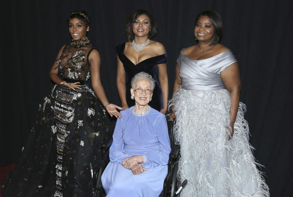 Janelle Monae, from left, Taraji P. Henson, and Octavia Spencer pose with Katherine Johnson, seated, backstage at the Oscars on Sunday, Feb. 26, 2017, at the Dolby Theatre in Los Angeles. (Photo by Matt Sayles/Invision/AP)