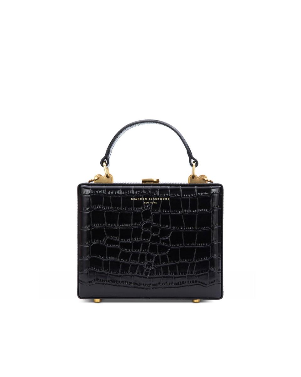 <p><a href="https://go.redirectingat.com?id=74968X1596630&url=https%3A%2F%2Fwww.neimanmarcus.com%2Fp%2Fbrandon-blackwood-kendrick-trunk-mini-croc-embossed-top-handle-bag-prod262660332&sref=https%3A%2F%2Fwww.biography.com%2Fbio-buys%2Fg46120023%2Fbest-taylor-swift-gifts%2F" rel="nofollow noopener" target="_blank" data-ylk="slk:Shop Now;elm:context_link;itc:0;sec:content-canvas" class="link ">Shop Now</a></p><p>Kendrick Trunk</p><p>neimanmarcus.com</p><p>$285.00</p>