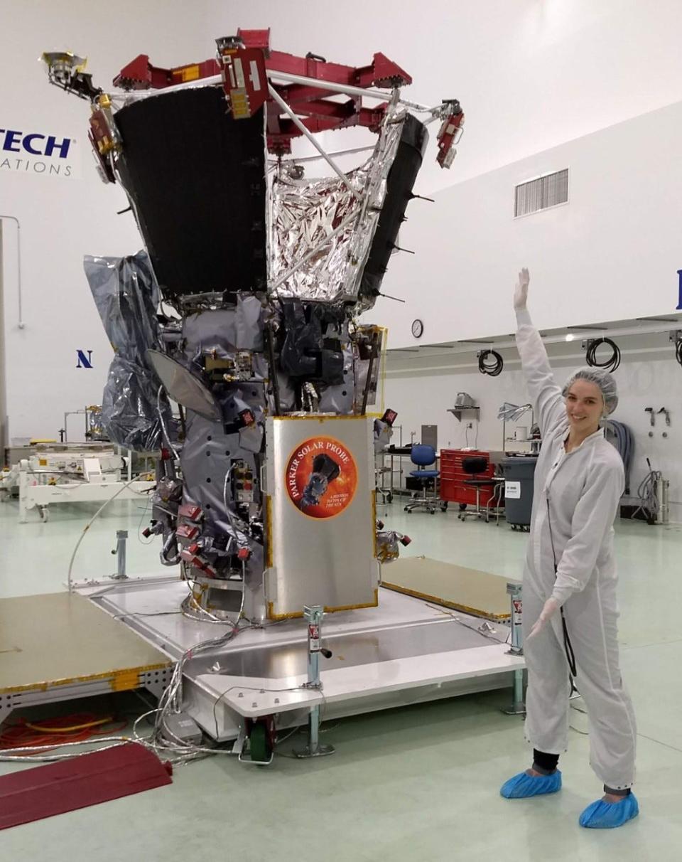Whittlesey pictured with one of her projects, the Parker Solar Probe spacecraft. The probe, which Whittlesey described as “a satellite of the sun,” was launched in 2018.