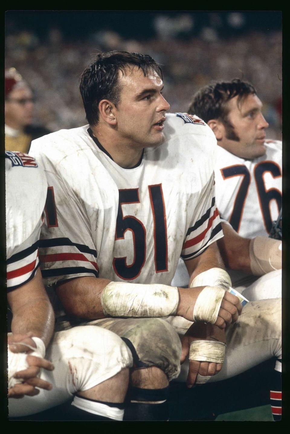 PHOTO: Dick Butkus #51 of the Chicago Bears on the bench against the Green Bay Packers in a circa mid 1960's NFL football game at Lambeau frield in Green Bay, Wisconsin. (Focus On Sport/Getty Images)