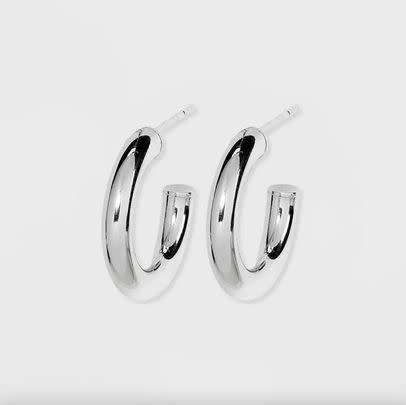 A pair of oversized sterling silver hoops