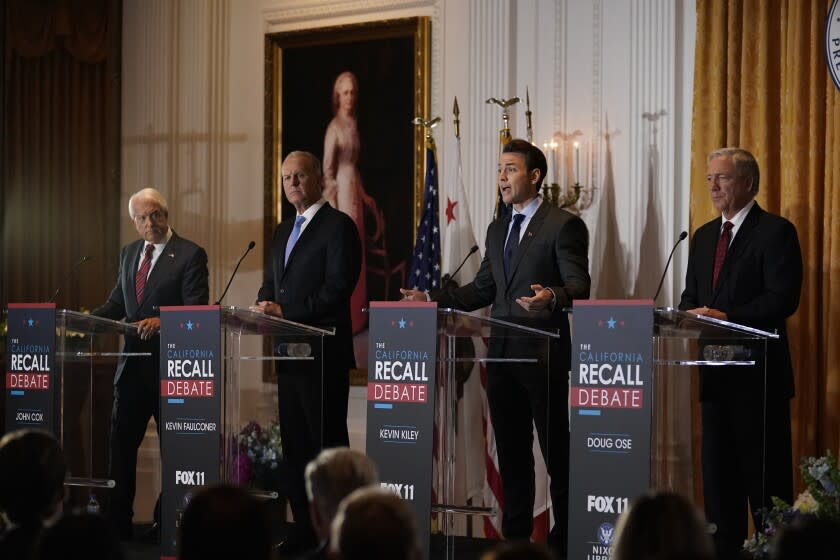 From left, Republican candidates for California Governor John Cox, Kevin Faulconer, Kevin Kiley and Doug Ose participate in a debate at the Richard Nixon Presidential Library Wednesday, Aug. 4, 2021, in Yorba Linda, Calif. California Gov. Gavin Newsom faces a Sept. 14 recall election that could remove him from office. (AP Photo/Marcio Jose Sanchez)