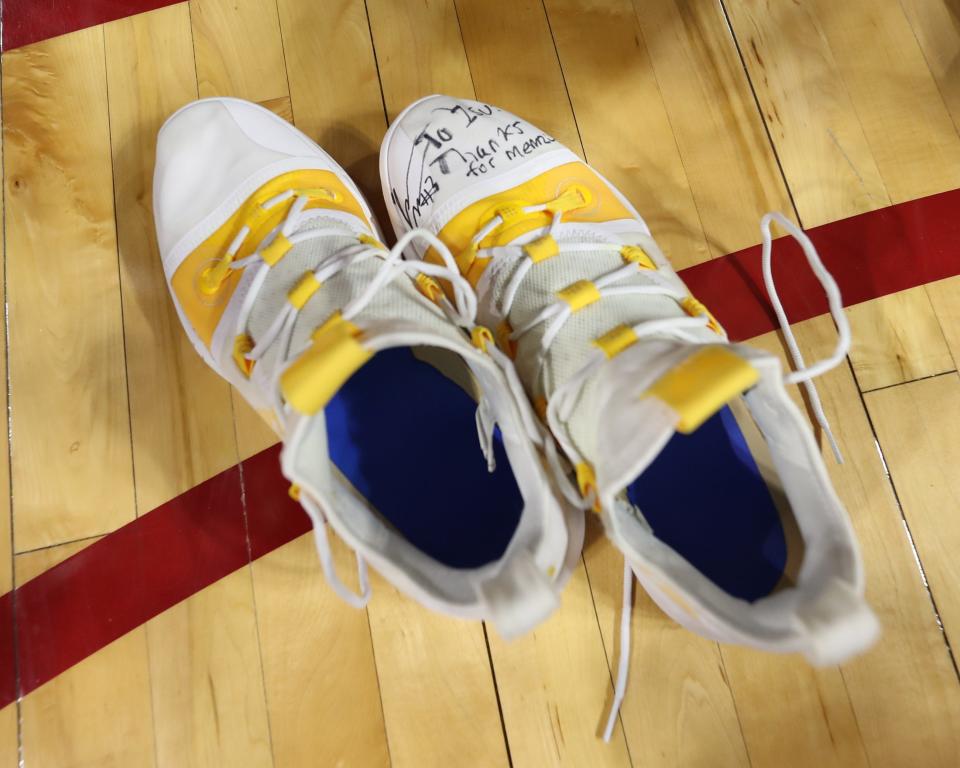 Dec 12, 2019; Ames, IA, USA; Iowa Hawkeyes guard Jordan Bohannon (3) signs a note to Iowa  Statethanking them for the memories after their win against the Cyclones at Hilton Coliseum. The Hawkeyes beat the Cyclones 84-68.