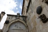 A bronze sculpture by Italian artist Alessandro Mutto is seen at one of the Stations of the Cross along the Via Dolorosa, amid the coronavirus disease (COVID-19) outbreak in Jerusalem's Old City