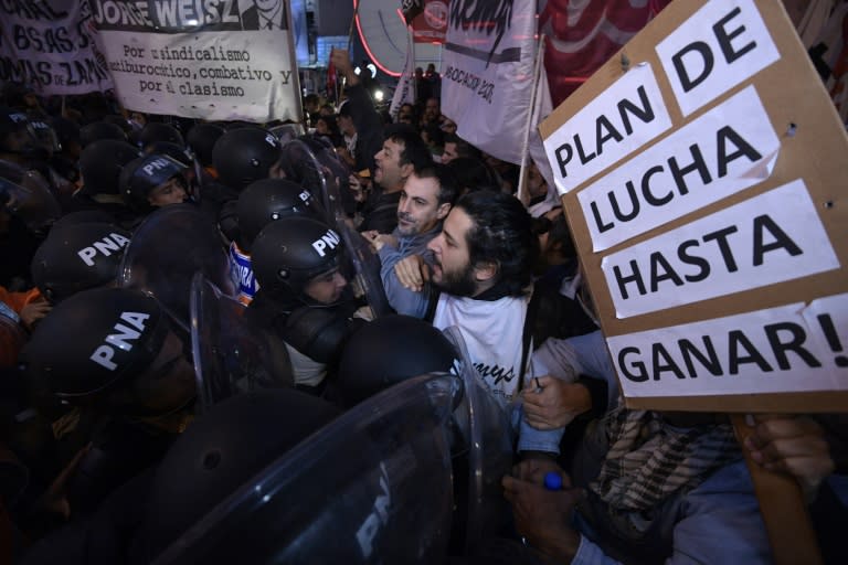 Teachers clash with Argentine security forces during a 24-hour general strike demanding President Mauricio Macri take action against inflation and keep campaign promises