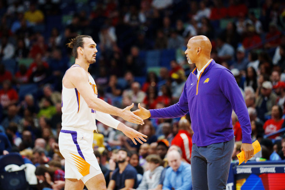 Dec 11, 2022; New Orleans, Louisiana, USA; Phoenix Suns head coach Monty Williams high fives forward Dario Saric (20) during the first quarter against the New Orleans Pelicans at Smoothie King Center. Mandatory Credit: Andrew Wevers-USA TODAY Sports
