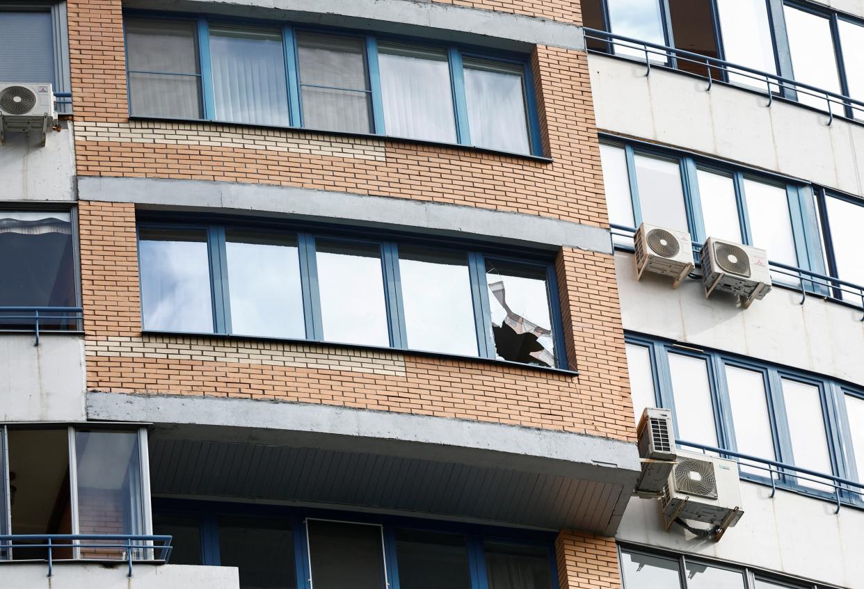 A view shows a broken window in a multi-storey apartment block following a reported drone attack in Moscow, Russia (REUTERS)