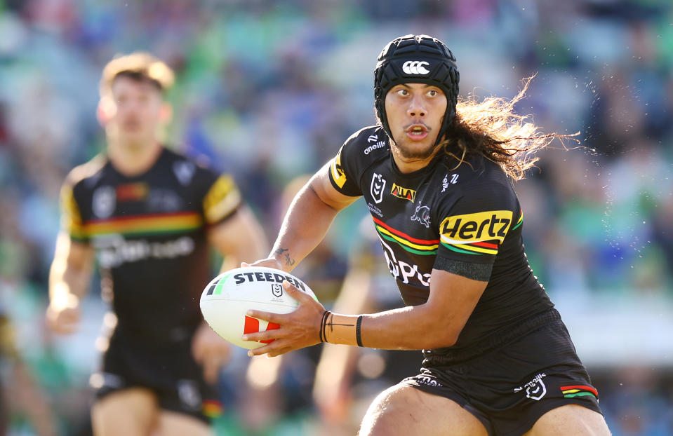 Jarome Luai runs the ball.