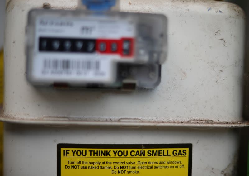 FILE PHOTO: A warning label is seen on the front of a gas meter at a house in Manchester