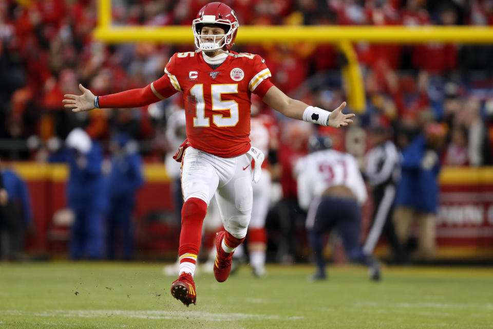Kansas City Chiefs quarterback Patrick Mahomes (15) celebrates after throwing a touchdown pass during the second half of an NFL divisional playoff football game against the Houston Texans, in Kansas City, Mo., Sunday, Jan. 12, 2020. (AP Photo/Jeff Roberson)