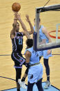 Sacramento Kings forward Louis King (23) shoots against Memphis Grizzlies center Xavier Tillman (2) in the second half of an NBA basketball game Friday, May 14, 2021, in Memphis, Tenn. (AP Photo/Brandon Dill)