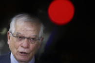 European Union foreign policy chief Josep Borrell speaks to the media as he arrives for a meeting of EU foreign ministers at the European Council building in Brussels, Monday, Feb 22, 2021. European Union foreign ministers on Monday will look at options for imposing fresh sanctions against Russia over the jailing of opposition leader Alexei Navalny as the 27-nation bloc considers the future of its troubled ties with the country. (Yves Herman, Pool via AP)