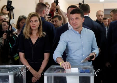 Ukraine's President Zelenskiy casts his ballot at a polling station during a parliamentary election in Kiev