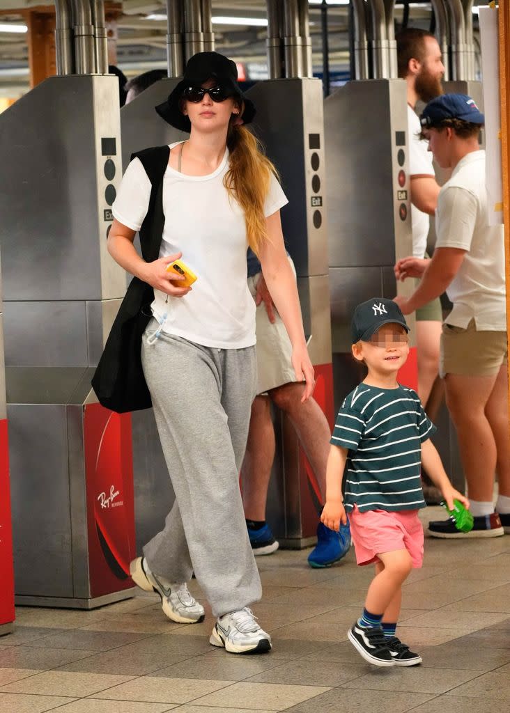 Jennifer Lawrence with her son Cy in New York's Subway