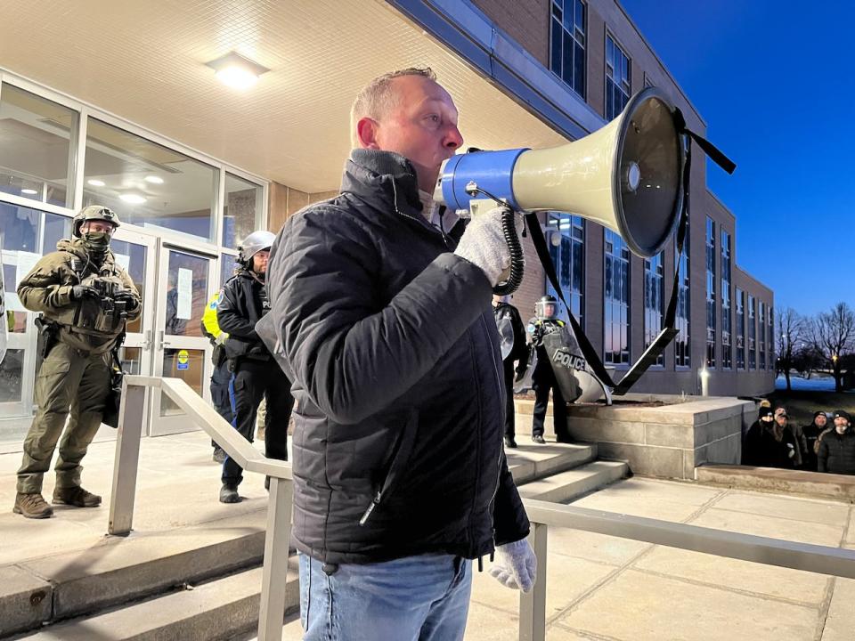 John Efford Jr. speaks to a crowd of protesters on Thursday morning around 6:30 a.m. 