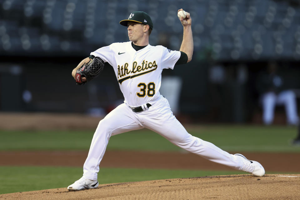 Oakland Athletics' JP Sears (38) throws against the Seattle Mariners during the first inning of a baseball game in Oakland, Calif., Tuesday, Sept. 20, 2022. (AP Photo/Jed Jacobsohn)