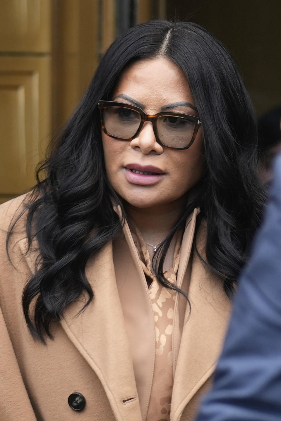 Jennifer Shah leaves federal court in New York, Friday, Jan. 6, 2023. A judge sentenced Shah, a member of “The Real Housewives of Salt Lake City”, to 6 1/2 years in prison on Friday for defrauding thousands of people nationwide in a telemarketing scam, many of them vulnerable or older. (AP Photo/Seth Wenig)