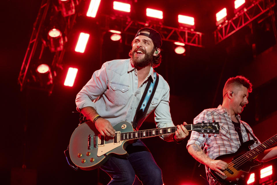 FILE - Thomas Rhett performs during CMA Fest in Nashville, Tenn., on June 10, 2022. Rhett, Sam Hunt, Chris Young, Lee Brice and Lainey Wilson will headline the Country Bay Music Festival scheduled for Nov. 11-12 in Biscayne Bay. (Photo by Amy Harris/Invision/AP, File)