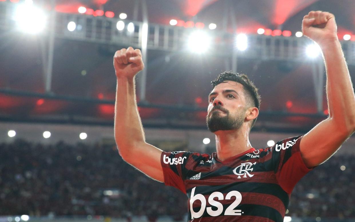 Flamengo centre-back Pablo Mari, pictured here celebrating after scoring against Gremio in the Copa Libertadores, has returned to Brazil after spending the weekend in London - Getty Images South America