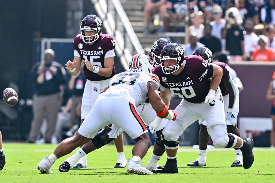 Sep 23, 2023; College Station, Texas; Texas A&M Aggies offensive lineman Trey Zuhn III (60) in action during the first quarter at Kyle Field. Maria Lysaker-USA TODAY Sports