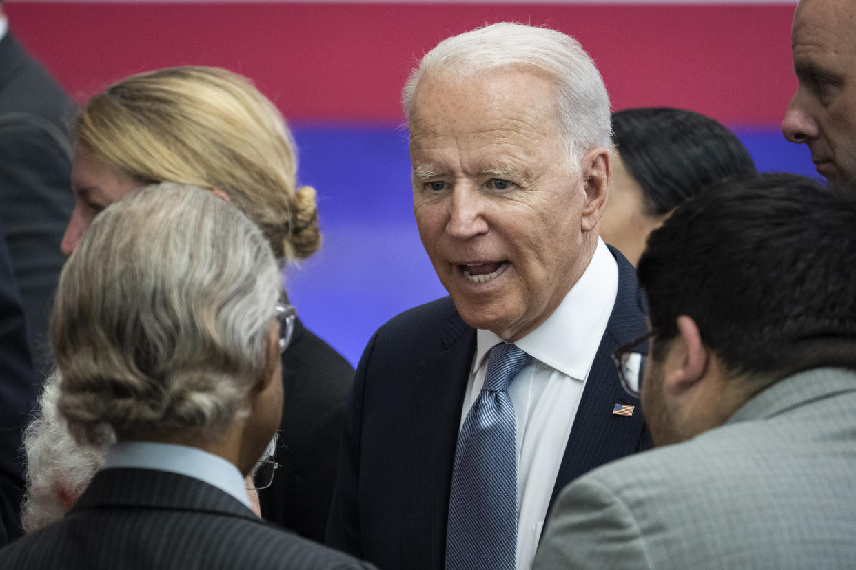 President Joe Biden talks with Al Sharpton after speaking about voting rights at the National Constitution Center on July 13, 2021 in Philadelphia, Pennsylvania. (Photo by Drew Angerer/Getty Images)