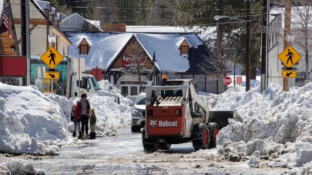 PHOTO: Big Bear Lake streets are still choked with snow following successive storms which blanketed San Bernardino Mountain communities, March 3, 2023 in Big Bear Lake, Calif. (Brian Van Der Brug/Los Angeles Times via Getty Images)