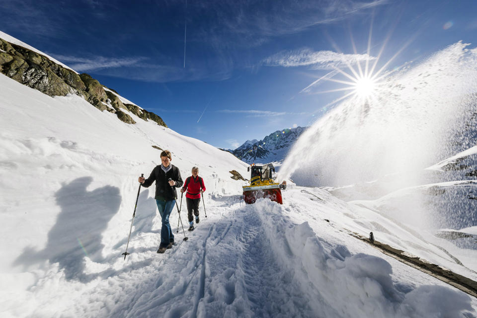 Clearing snow off the road at the Great St. Bernard pass