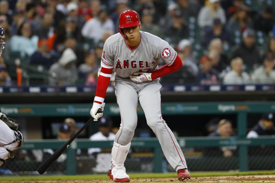 Los Angeles Angels' Shohei Ohtani reacts after a foul ball hit him during the fifth inning of the team's baseball game against the Detroit Tigers in Detroit, Tuesday, May 7, 2019. (AP Photo/Paul Sancya)
