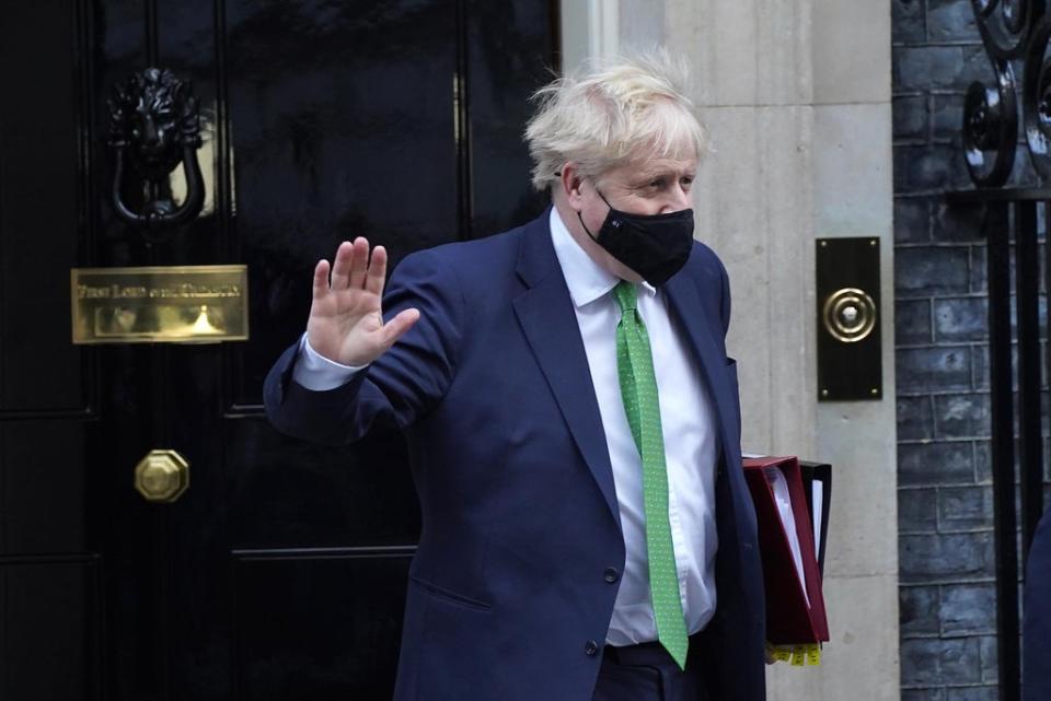 Boris Johnson has been told by a former minister and senior Tory MP to “in the name of God, go” as he lost one of his newest MPs in a dramatic defection to Labour minutes before Prime Minister’s Questions began (PA) (PA Wire)