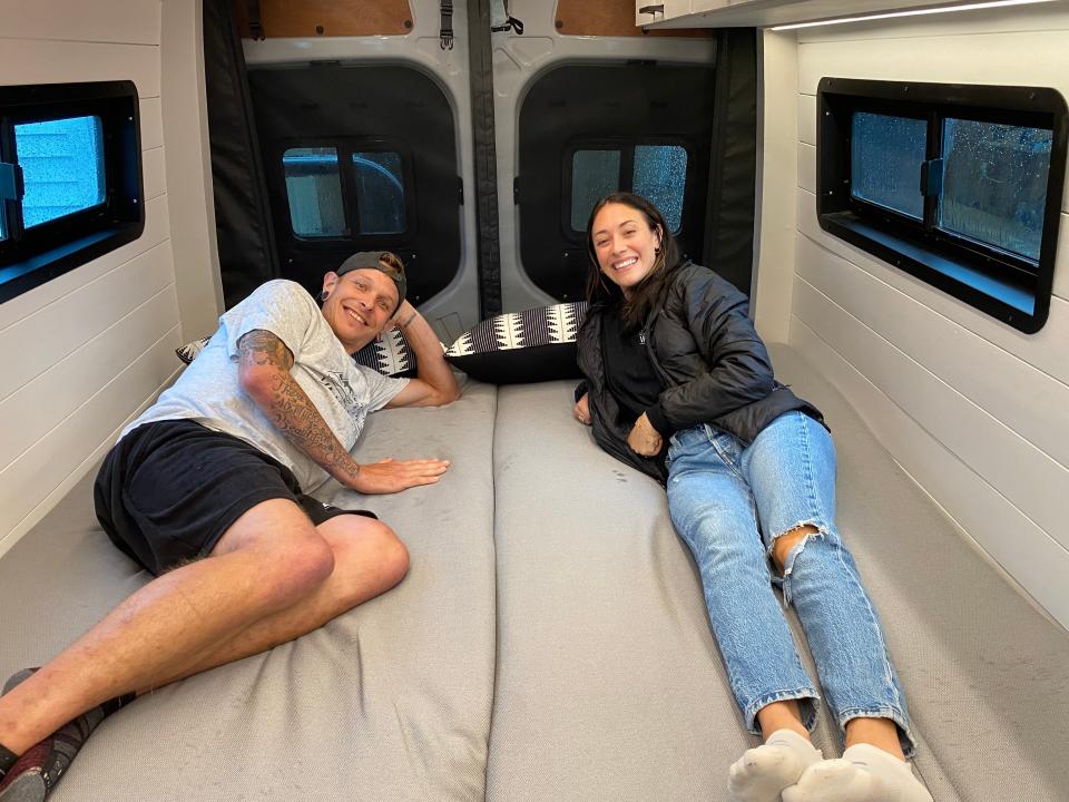 Danny and Kelley Diatchenko from VaVaVans showing off some of their custom camper work. In this full build they did, the dining table and seating area converts into a bed for the owner. Photo taken August 18, 2023.