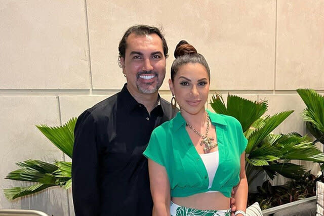 Jennifer Aydin and Bill Aydin pose for a photo together.